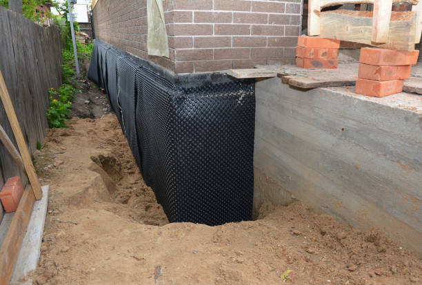 Happy homeowners after waterproofing job in Liverpool